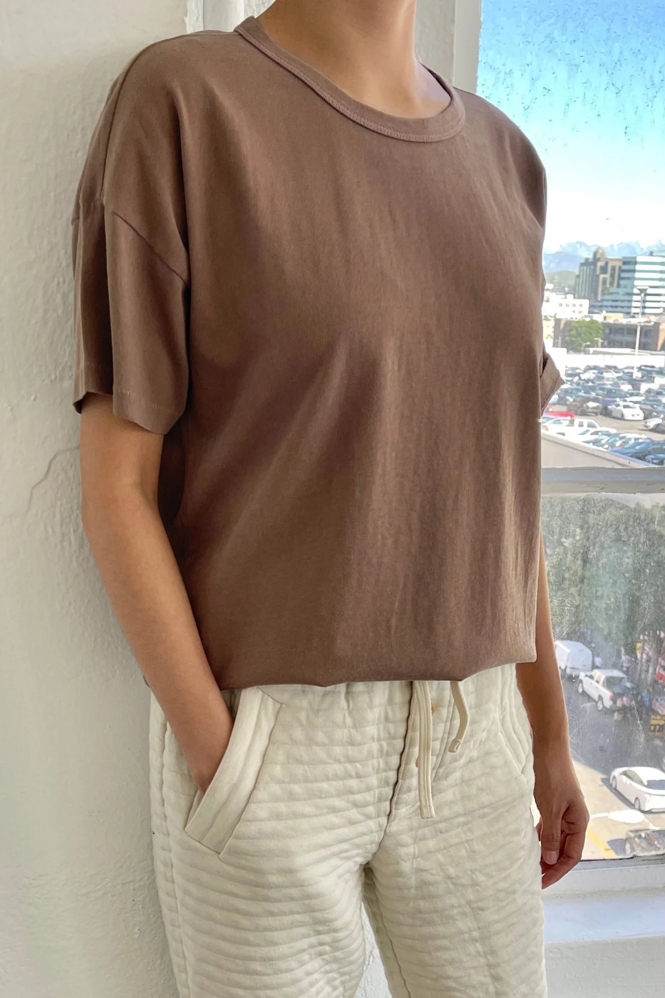 Her Tee